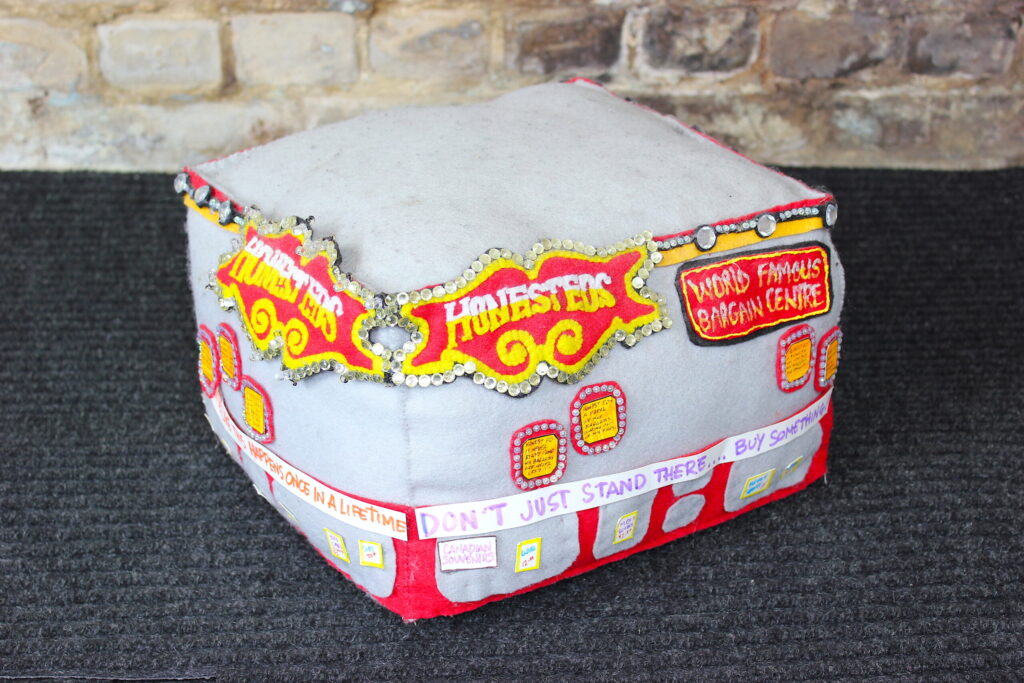 Felt model of Honest Ed's department store